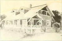 An illustration from The plan book of American dwellings : being a compilation of original home designs, showing actual photographic exteriors and floor plans of moderately priced bungalows, cottages, residences (1914)
