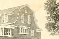 An illustration from The plan book of American dwellings : being a compilation of original home designs, showing actual photographic exteriors and floor plans of moderately priced bungalows, cottages, residences (1914)