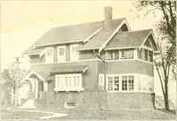An illustration from The plan book of American dwellings : being a compilation of original home designs, showing actual photographic exteriors and floor plans of moderately priced bungalows, cottages, residences (1914)