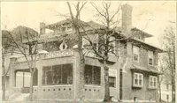 An illustration from The plan book of American dwellings : being a compilation of original home designs, showing actual photographic exteriors and floor plans of moderately priced bungalows, cottages, residences (1914)