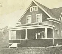 An illustration from The plan book of American dwellings : being a compilation of original home designs, showing actual photographic exteriors and floor plans of moderately priced bungalows, cottages, residences (1914)