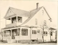 An illustration from The plan book of American dwellings : being a compilation of original home designs, showing actual photographic exteriors and floor plans of moderately priced bungalows, cottages, residences (1914)