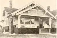 An illustration from The plan book of American dwellings : being a compilation of original home designs, showing actual photographic exteriors and floor plans of moderately priced bungalows, cottages, residences (1914)