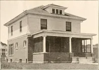 An illustration from The plan book of American dwellings : being a compilation of original home designs, showing actual photographic exteriors and floor plans of moderately priced bungalows, cottages, residences (1914)