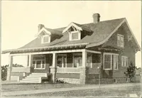 An illustration from The plan book of American dwellings : being a compilation of original home designs, showing actual photographic exteriors and floor plans of moderately priced bungalows, cottages, residences (1914)