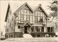 An illustration from The plan book of American dwellings : being a compilation of original home designs, showing actual photographic exteriors and floor plans of moderately priced bungalows, cottages, residences (1914)