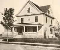 An illustration from The plan book of American dwellings : being a compilation of original home designs, showing actual photographic exteriors and floor plans of moderately priced bungalows, cottages, residences (1914)