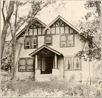 An illustration from The plan book of American dwellings : being a compilation of original home designs, showing actual photographic exteriors and floor plans of moderately priced bungalows, cottages, residences (1914)