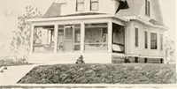 An illustration from The plan book of American dwellings : being a compilation of original home designs, showing actual photographic exteriors and floor plans of moderately priced bungalows, cottages, residences (1914)