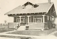 An illustration from The plan book of American dwellings : being a compilation of original home designs, showing actual photographic exteriors and floor plans of moderately priced bungalows, cottages, residences (1914)