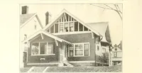 An illustration from The plan book of American dwellings : being a compilation of original home designs, showing actual photographic exteriors and floor plans of moderately priced bungalows, cottages, residences (1914)