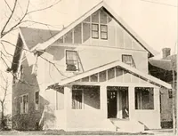 An illustration from The plan book of American dwellings : being a compilation of original home designs, showing actual photographic exteriors and floor plans of moderately priced bungalows, cottages, residences (1914)