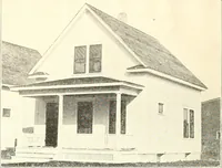 An illustration from The plan book of American dwellings : being a compilation of original home designs, showing actual photographic exteriors and floor plans of moderately priced bungalows, cottages, residences (1914)