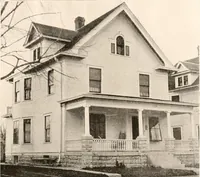 An illustration from The plan book of American dwellings : being a compilation of original home designs, showing actual photographic exteriors and floor plans of moderately priced bungalows, cottages, residences (1914)