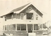 An illustration from The plan book of American dwellings : being a compilation of original home designs, showing actual photographic exteriors and floor plans of moderately priced bungalows, cottages, residences (1914)