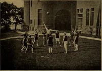 An illustration from Play, comprising games for the kindergarten, playground, schoolroom and college; how to coach and play girls' basket-ball, etc (1912)