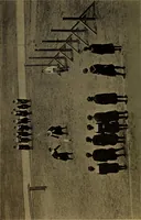 An illustration from Play, comprising games for the kindergarten, playground, schoolroom and college; how to coach and play girls' basket-ball, etc (1912)