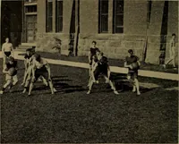An illustration from Play, comprising games for the kindergarten, playground, schoolroom and college; how to coach and play girls' basket-ball, etc (1912)