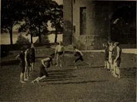 An illustration from Play, comprising games for the kindergarten, playground, schoolroom and college; how to coach and play girls' basket-ball, etc (1912)