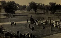 An illustration from Play, comprising games for the kindergarten, playground, schoolroom and college; how to coach and play girls' basket-ball, etc (1912)