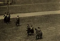 An illustration from Play, comprising games for the kindergarten, playground, schoolroom and college; how to coach and play girls' basket-ball, etc (1912)