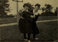 An illustration from Play, comprising games for the kindergarten, playground, schoolroom and college; how to coach and play girls' basket-ball, etc (1912)