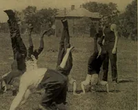 An illustration from Play, comprising games for the kindergarten, playground, schoolroom and college; how to coach and play girls' basket-ball, etc (1912)