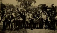 An illustration from Play, comprising games for the kindergarten, playground, schoolroom and college; how to coach and play girls' basket-ball, etc (1912)