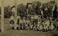 An illustration from Play, comprising games for the kindergarten, playground, schoolroom and college; how to coach and play girls' basket-ball, etc (1912)