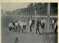 An illustration from Play, comprising games for the kindergarten playground, schoolroom, and college, how to coach and play girls' basket-ball, etc (1910)