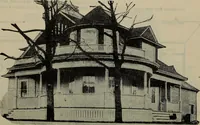 An illustration from Practical bungalows and cottages for town and country, perspective views and floor plans for three hundred low and medium priced houses and bungalows .. (1916)