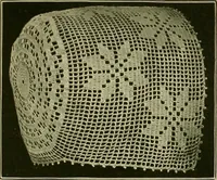 An illustration from The Priscilla filet crochet book : a collection of beautiful designs in filet crochet, equally adapted to cross-stitch beads and canvas with working directions (1915)