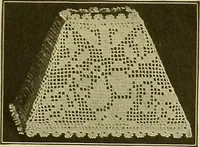 An illustration from The Priscilla filet crochet book, no. 2 ; a collection of beautiful designs in filet crochet, introducing filet crochet brodé, embroidery on crochet and cameo crochet (1914)
