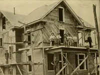 An illustration from Radford's brick houses and how to build them : a standard collection of new, original, and artistic designs for brick houses, apartments, stores and flats, garages, etc. ; together with complete instruction in the manufacture of brick and its practical uses as a building material selected and compiled by William A. Radford ... Every plan designed and executed by a corps of licensed architects of the highest professional standing, assisted by a staff of expert draftsmen. Over 300 designs and details. (1912)