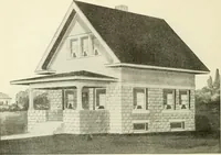 An illustration from Radford's combined house and barn plan book (1908)
