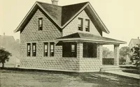 An illustration from Radford's combined house and barn plan book (1908)