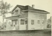An illustration from Radford's combined house and barn plan book (1908)