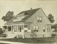 An illustration from Radford's combined house and barn plan book (1908)