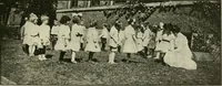 An illustration from Rhythmic action plays and dances; a book of original games and dances, arranged progressively, to Mother Goose and other action songs, with a teaching introductory; for the kindergarten, primary schools, playground and gymnasium (1915)
