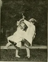 An illustration from Rhythmic action plays and dances; a book of original games and dances, arranged progressively, to Mother Goose and other action songs, with a teaching introductory; for the kindergarten, primary schools, playground and gymnasium (1915)