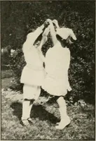 An illustration from Rhythmic action plays and dances; a book of original games and dances, arranged progressively, to Mother Goose and other action songs, with a teaching introductory; for the kindergarten, primary schools, playground and gymnasium (1915)