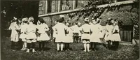 An illustration from Rhythmic action plays and dances; a book of original games and dances, arranged progressively, to Mother Goose and other action songs, with a teaching introductory; for the kindergarten, primary schools, playground and gymnasium (1915)