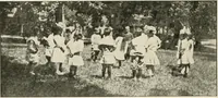 An illustration from Rhythmic action plays and dances; a book of original games and dances, arranged progressively, to Mother Goose and other action songs, with a teaching introductory; for the kindergarten, primary schools, playground and gymnasium (1915)