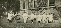An illustration from Rhythmic action plays and dances; a book of original games and dances, arranged progressively, to Mother Goose and other action songs, with a teaching introductory; for the kindergarten, primary schools, playground and gymnasium (1915)
