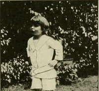An illustration from Rhythmic action plays and dances; a book of original games and dances, arranged progressively, to Mother Goose and other action songs, with a teaching introductory; for the kindergarten, primary schools, playground and gymnasium (1915)