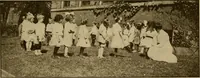An illustration from Rhythmic action plays and dances; a book of original games and dances, arranged progressively, to Mother Goose and other action songs, with a teaching introductory; for the kindergarten, primary schools, playground and gymnasium (1915)