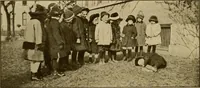 An illustration from Rhythmic action plays and dances; a book of original games and dances, arranged progressively, to Mother Goose and other action songs, with a teaching introductory; for the kindergarten, primary schools, playground and gymnasium (1915)