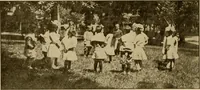 An illustration from Rhythmic action plays and dances; a book of original games and dances, arranged progressively, to Mother Goose and other action songs, with a teaching introductory; for the kindergarten, primary schools, playground and gymnasium (1915)