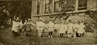 An illustration from Rhythmic action plays and dances; a book of original games and dances, arranged progressively, to Mother Goose and other action songs, with a teaching introductory; for the kindergarten, primary schools, playground and gymnasium (1915)
