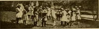 An illustration from Rhythmic action plays and dances; a book of original games and dances, arranged progressively, to Mother Goose and other action songs, with a teaching introductory; for the kindergarten, primary schools, playground and gymnasium (1915)